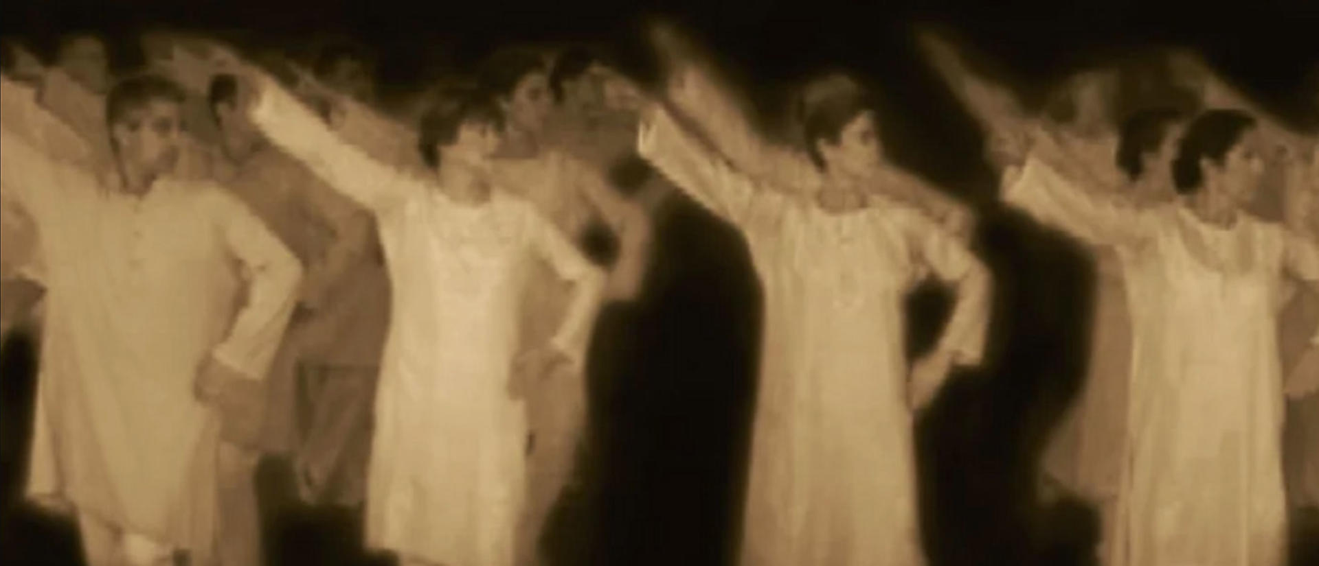Sepia hued figures is tunics dancing